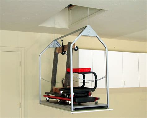 Bar to hang bicycles, golf bags, canoes, kayaks and a wide variety of items. Attic Storage Lift Attic In 2019 Garage Attic Overhead ...