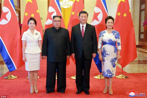 North korean leader kim jong un and his wife ri sol ju attend the opening ceremony of the rungna people's pleasure ground on rungna islet along the taedong river in pyongyang in this july 25, 2012 photograph released by the north's kcna to reuters on july 26, 2012. Kim Jong-un and wife pose with Chinese President Xi Jinping | Daily Mail Online