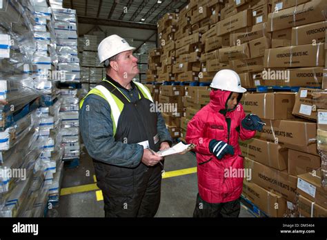 Us Department Of Agriculture Food Safety Inspector Examines A Shipment Of Imported Frozen Meat