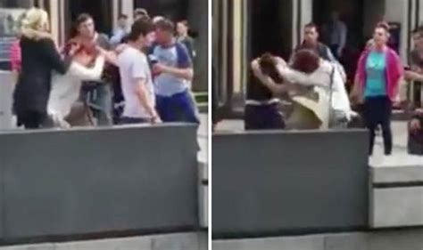 Two Women Throw Each Other To The Ground During Fight In The Middle Of A Busy Shop Street Uk