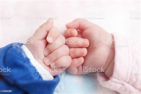 Close Up Of Newborn Twins Hands Stock Photo Download Image Now Istock