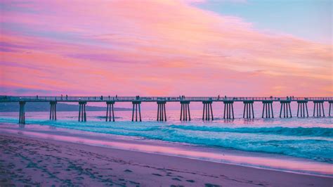Download Wallpaper 1366x768 Pier Sea Surf Pink Hermosa Beach