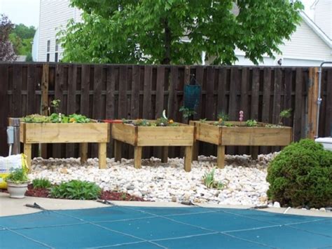This particular bed is both functional and beautiful. 15 Beautiful DIY Raised Garden Bed Projects