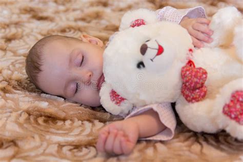 Baby Sleeping With Teddy Bear Stock Photo Image Of Childhood