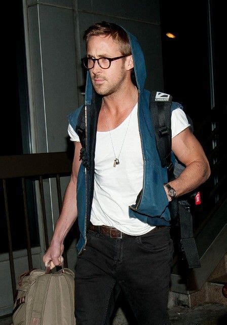 Ryan Gosling Arrived In Los Angeles Late Last Night In Glasses And A Hoodie Vest Over A Simple