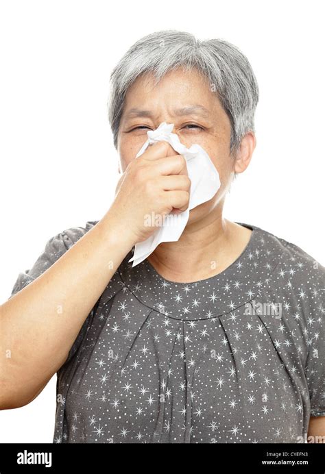 Mature Asian Woman Sneezing Hi Res Stock Photography And Images Alamy