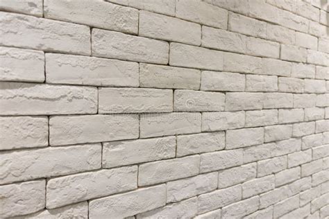 Side View Of Empty White Brick Wall In Room Textured And Background