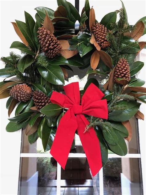 Made From Front Yard Magnolia Tree And Pine Cones With Dollar Store Red