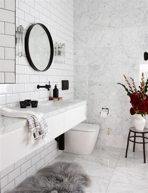 Elegant kitchen backsplash glass tiles. Bathroom profile: Marble & subway tiles