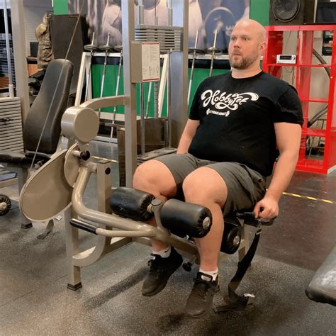 How To Do Seated Leg Curl Muscles Worked And Proper Form Strengthlog