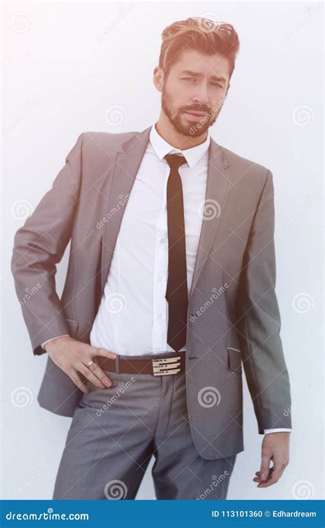 Serious Businessman With Hands On Hips Isolated Background Stock Photo