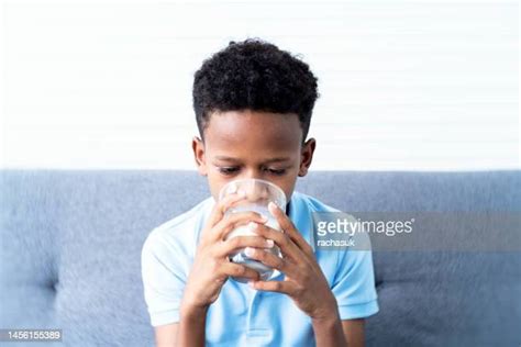 Teenage Boy Drinking Milk Photos And Premium High Res Pictures Getty