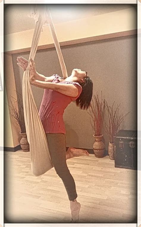 Surrender In Bow And Arrow Pose Aerial Yoga Poses Ballet Skirt