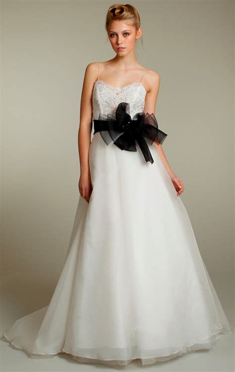 Stunning backless long sleeves ball gown organza wedding dress with beading lace top. Choose Your Fashion Style: Wedding Dresses with Black Sashes