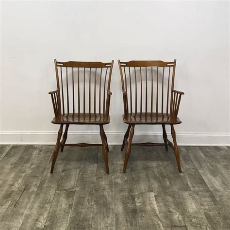 Be the captain of your home, while siddled within the comfortable confines of one of these captain's chairs. Pair Of Cherry Windsor Captains Dining Chairs by Madison ...