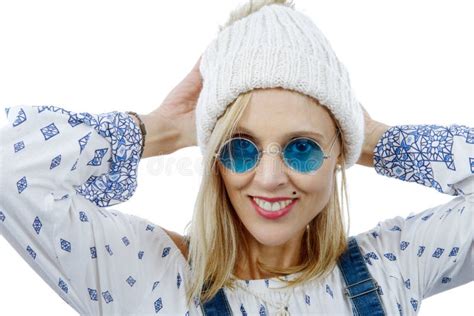 Beautiful Blonde Woman With Blue Sunglasses And Winter Hat Stock Photo