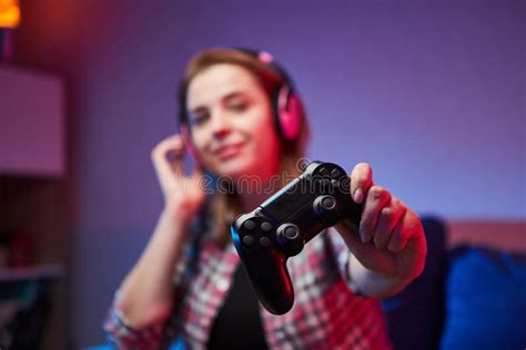 Portrait Of Crazy Playful Gamer Girl Enjoying Playing Video Games