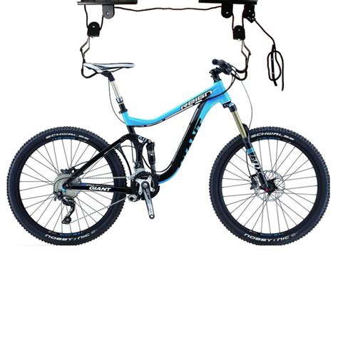 Store your bikes overhead and out of the way 100 lb. Ceiling Mounted Hoist Bicycle Lift | Bike lift, Bicycle ...