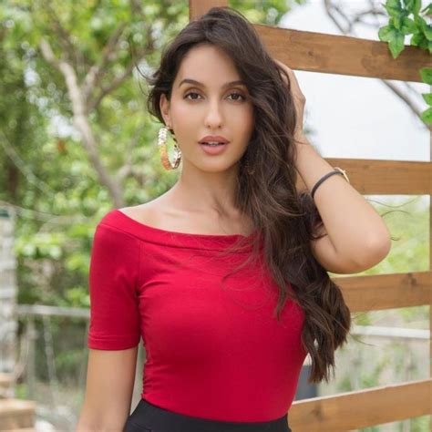 26 photos of nora fatehi damn hot plus sexy