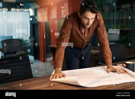 Man Leaning Over Table Reading Hi Res Stock Photography And Images Alamy