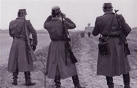 east german police officers equipped with kar98s and a stg44 overlooking at the border sometime