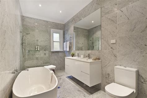 From the square floor tiles to the dated sink faucets, this bathroom is an unsightly throwback to the 1980s. How to source cheap bathroom tiles in Perth - Ross's ...