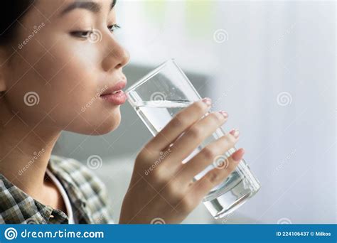 closeup of asian woman drinking spring water stock image image of resting carefree 224106437
