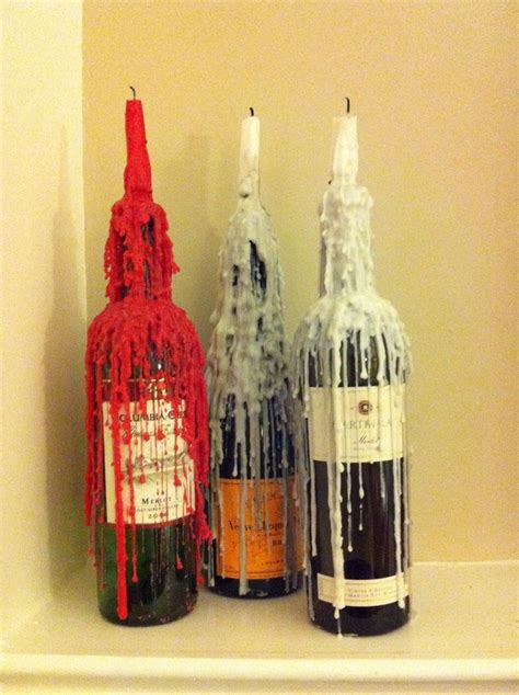 wine bottle candle holder fun project i used them as decoration on top of the fireplace