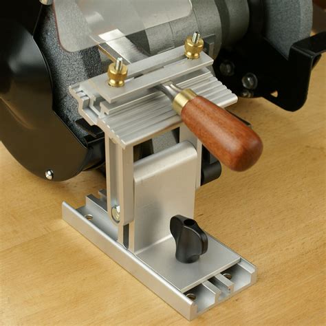 A bench grinder is a benchtop type of grinding machine used to drive abrasive wheels. Adjustable Replacement Tool Rest Sharpening Jig for Bench Grinder