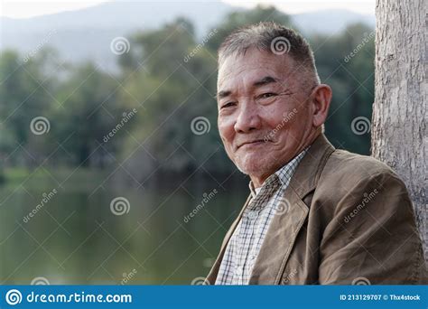 Asian Old Man Sitting And Relaxing In Public Park Stock Image Image Of Concept Relax 213129707