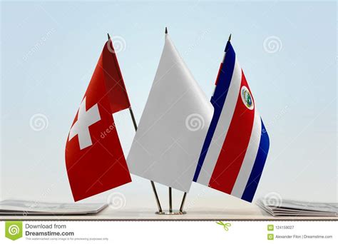 Banderas De Suiza Y De Costa Rica Imagen De Archivo Imagen De Asta