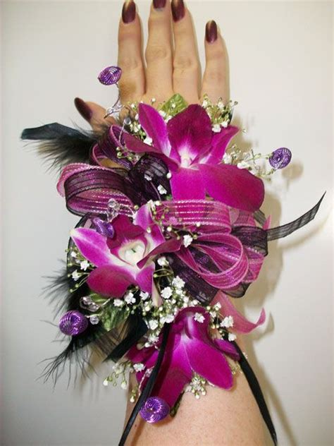 wristlet corsage with magenta orchids wrist corsage prom corsage prom homecoming corsage