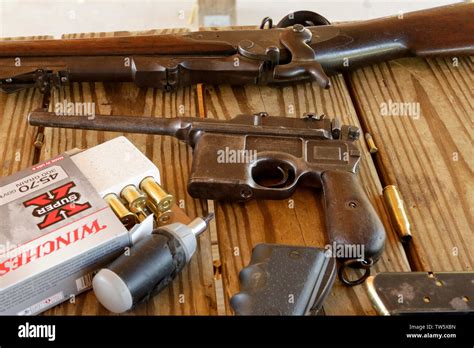 Mauser C96 Handgun And 45 70 Trapdoor Rifle Stock Photo Alamy
