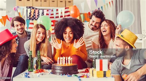 Colleagues Celebrating Birthday Party In The Office Stock Photo