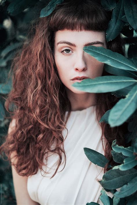 Portrait Of A Beautiful Young Woman With Green Eyes By Stocksy