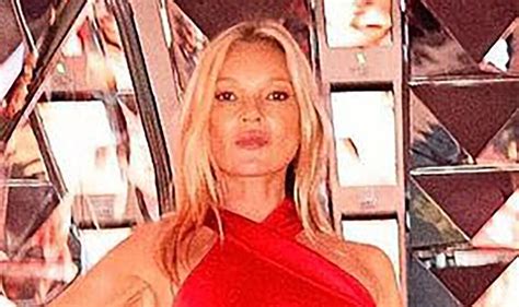 Kate Moss Puts On Racy Display As She Goes Braless In Red Satin Gown For Diet Coke Launch