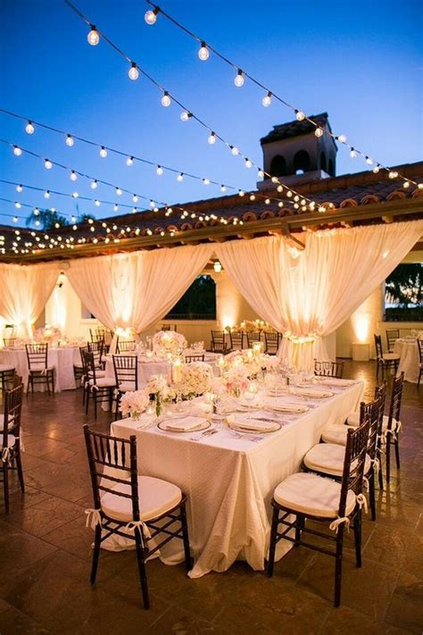 Awesome wedding signs are great wedding decor for an outdoor wedding ceremony and reception. outdoor wedding reception ideas with string lights ...