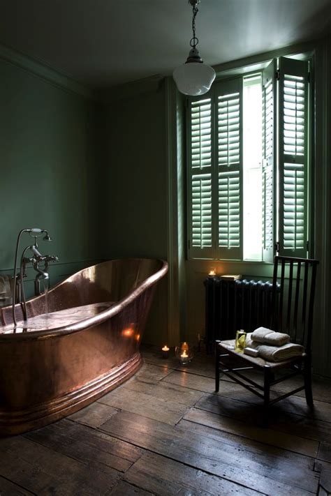 It is the ideal color to choose if your bathroom green bathrooms, well put together, can create a sense of natural calm. Copper tub, soft green walls, old wood floor. Id never ...