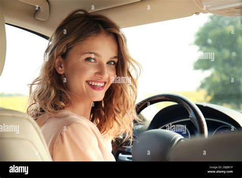 Pretty Young Woman Driving Car Stock Photo Alamy