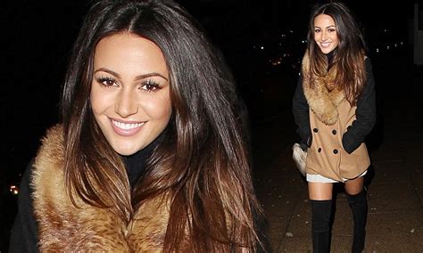 michelle keegan shows off her slim legs in black thigh high boots on night out daily mail online