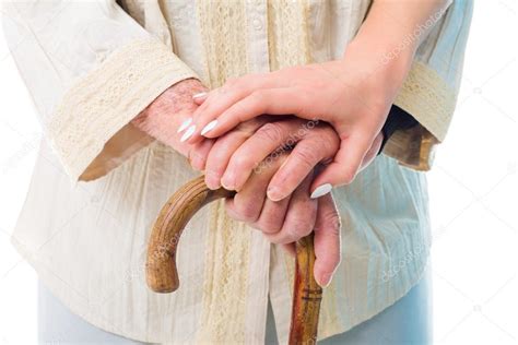 Elderly Womans Hands Held By A Consoling Hand — Stock Photo