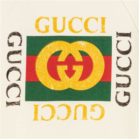 The gucci logo is often displayed in gold, a nod to the gucci brand's luxury and extravagance. Gucci - Ivory Cotton Logo Sweatshirt | Childrensalon