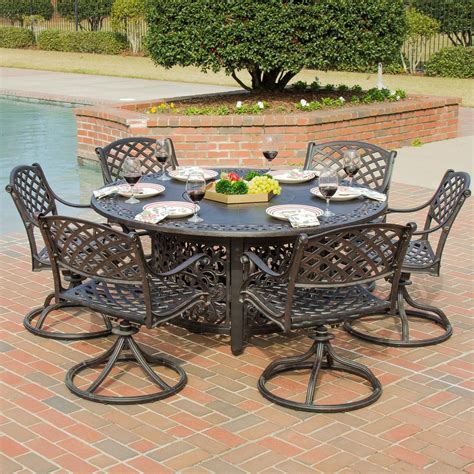 Outdoor dining sets with fire pit tables. Heritage 7 Piece Cast Aluminum Patio Fire Pit Dining Set ...