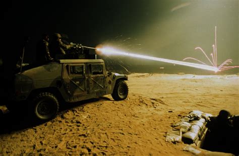 (it has 19.50 cal mgs instead of the 13). Humvee-mounted .50 cal fires tracers at a tank in the dark ...