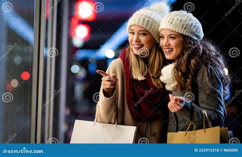 Portrait Of Cheerful Young Happy Woman Doing Christmas Shopping