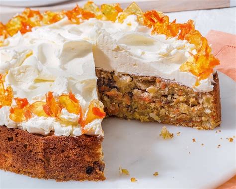 I love carrot cake and i almost always have a partial bag of carrots hanging out in my fridge because i love shredding one or two into different recipes can you assist on what the recipe, bake time, etc to make this into a full 2 tier cake (with icing in between the two layers), so a more traditional style cake? Tropical Carrot Cake - Bake from Scratch