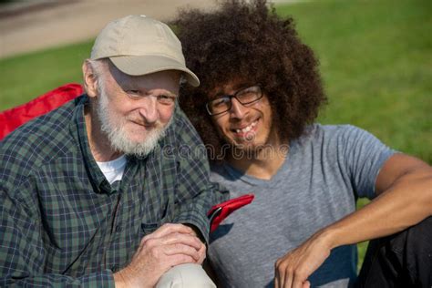 Old Man And Young Man Spending Time Together Stock Photo Image Of