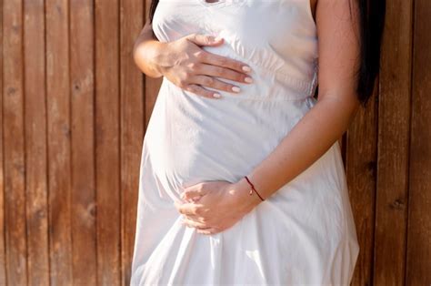 Free Photo Close Up Pregnant Woman Holding Belly