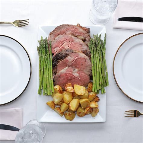 Pour back into roasting pan or large saucepan and return to heat. Prime Rib With Garlic Potatoes | Beef dinner, Prime rib roast, Garlic potatoes