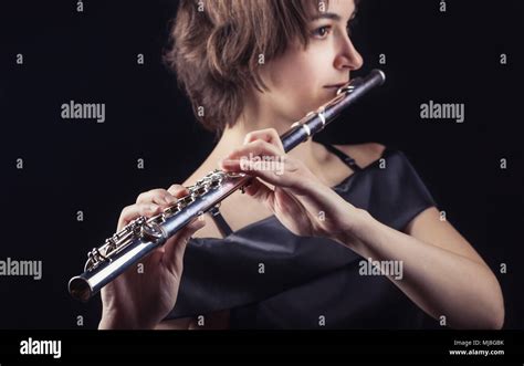 Babe Woman Playing Flute Hi Res Stock Photography And Images Alamy